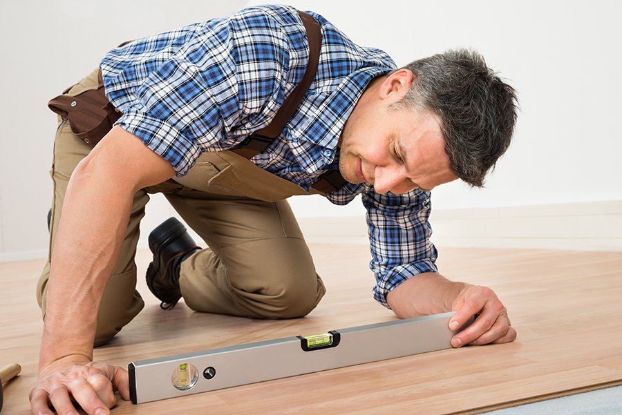men installing hardwood floor from Stoller Floors in Orrville, OH